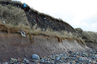 refuse tip overlaying boulder clay